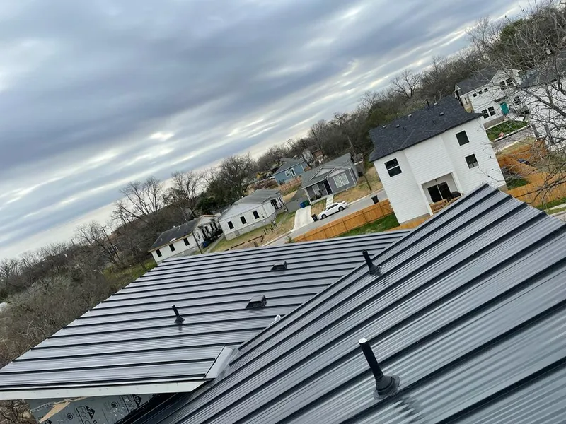 Standing seam metal roof panels with vents for Skylight Repair in Hayden